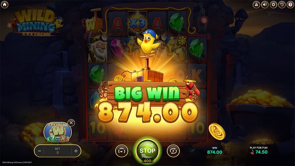 Big win screen in Wild Mining XXXtreme slot displaying a &euro;874 payout.