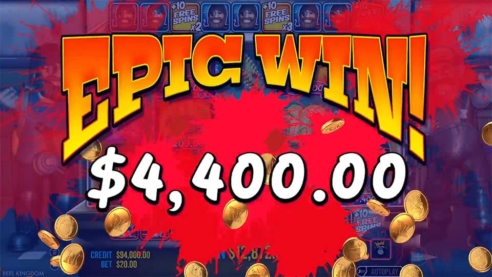 Huge &ldquo;Epic Win&rdquo; text splattered in blood-red across the screen with coins flying and payout displayed.