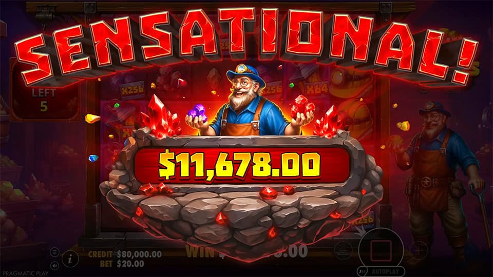 &ldquo;SENSATIONAL!&rdquo; lights up in bold red above the miner holding glowing gems, with explosions of crystals and coins in the background.