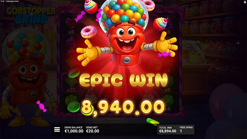 Joyful gumball machine character celebrating a glowing &ldquo;EPIC WIN&rdquo; surrounded by flying sweets and bright candy effects.
